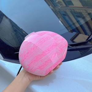 Detail showing pink marble texture on the oval irregular gradient evening clutch bag