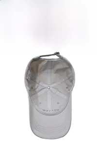 Detail view of the breathable mesh lining and adjustable metal buckle on light gray cap