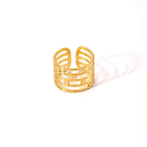 Macro detail of multi-layered golden stainless steel open ring with adjustable design