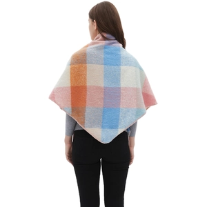 Back view of a woman wearing a plaid triangle scarf shawl in orange, blue and pink