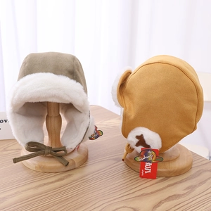 Winter faux suede pilot earflap hat for kids with soft plush lining in brown and yellow