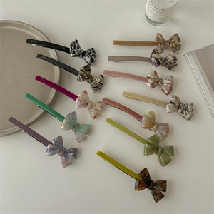 Minimalist acetate bow hair clips in 11 assorted colors with France Handmade engraving