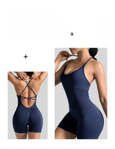 Detail of navy blue sports bodysuit showing adjustable shoulder straps and back cross design