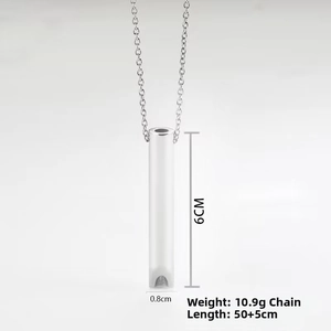 Detailed view of silver meditation breathing necklace pendant with size specifications
