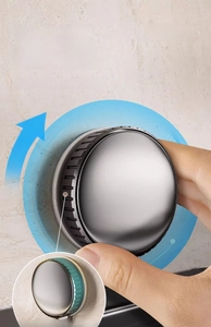 Close-up of suction cup hook with rotating mechanism for tool-free wall mounting