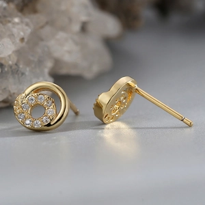 French style gold-plated swirl stud earrings with zircon crystals shown from multiple angles