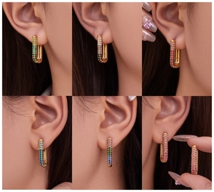 Detail view of 18k gold plated U-shaped earrings with colorful pavé cubic zirconia