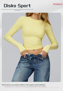 Close-up of light yellow brushed long sleeve yoga top with tight athletic fit and crew neck