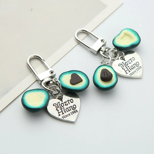 Creative avocado heart keychain set with metal tags and realistic resin charms