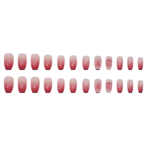 Glossy gradient pink to red press-on nails with 3D bow and heart relief designs