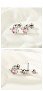 Macro detail of hollow gourd stud earring with pink zircon and screw ball back