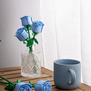 Building block light blue rose bouquet with five stems and a glass vase for home decor