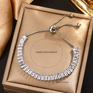 18K gold plated titanium bracelet with emerald-cut cubic zirconia and adjustable bolo clasp