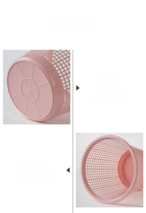 Macro view of pink plastic mesh trash bin showing reinforced bottom and large capacity