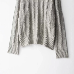Classic light grey cable-knit round neck sweater with ribbed cuffs and hem detail