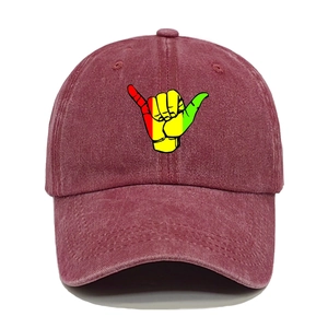 Close-up of shaka sign embroidery on vintage washed cotton baseball cap in burgundy