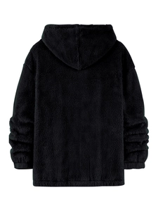 Detail of premium black fleece hoodie showing plush lamb wool texture and ribbed cuffs