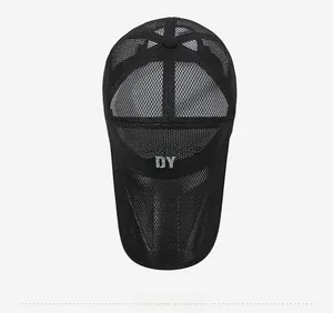 Top view of a breathable black mesh trucker hat with white TRADITIONS DY lettering print