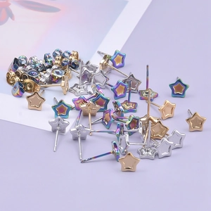 Close-up of star shaped 304 stainless steel studs in gold, silver and rainbow colors
