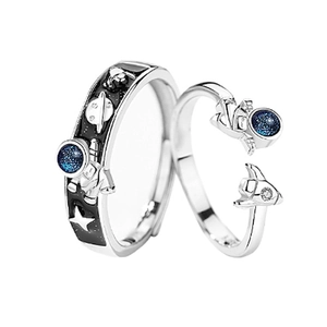 Astronaut couple ring set with rocket and planet enamel design on silver metal band