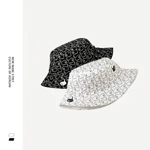 Double-sided cat embroidery bucket hats in black and white for summer sun protection