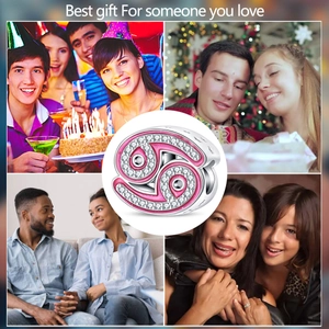 Detailed macro view of pink Cancer zodiac charm with cubic zirconia for bracelets