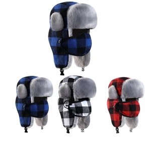 Winter plaid trapper hat with faux fur lining and matching face mask for cold protection