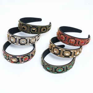 Baroque crystal headbands set with colorful rhinestones on wide black velvet frames