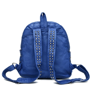 Retro dark blue leather backpack for women with silver studs on adjustable straps