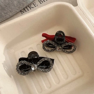 Velvet bow hair clips set with rhinestones for elegant styling and ponytail accessories