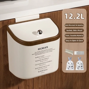 Detail of 12.2L cream hanging kitchen bin with wood grain trim and diamond handle