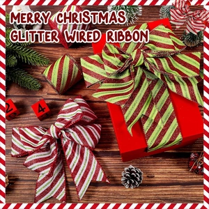 Close-up of festive red, green and white striped glitter wired ribbons with bows