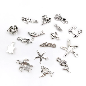 Detailed collection of silver alloy ocean charms including seahorses and starfish for DIY jewelry