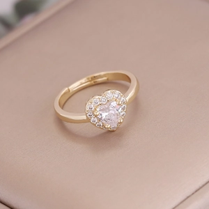 Macro shot of 18K gold plated heart ring with micro-paved cubic zirconia crystals