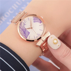 Women's rose gold mesh watch featuring a Tadi dial with purple leaf patterns