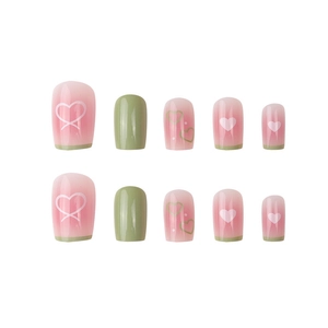 Press-on nail set with green and pink gradient heart designs in a glossy finish