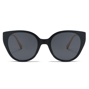 Fashionable oversized cat eye sunglasses with black frames and metal temples for women