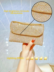 Close-up of high-brightness 5A grade rhinestones on champagne gold wave evening bag