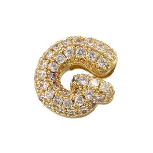 Macro shot of gold-plated letter C pendant encrusted with sparkling 5A cubic zirconia