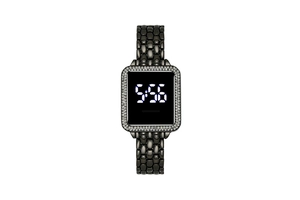 Macro shot of LED digital watch featuring a rhinestone bezel and dark metal chain strap