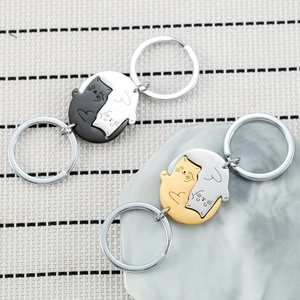 Porte-clés de couple en acier inoxydable avec motif de chats emboîtés en noir blanc et or argent