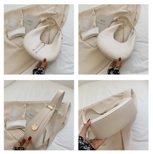 Detailed views of the cream-colored hobo bag showing golden zipper and smooth leather finish