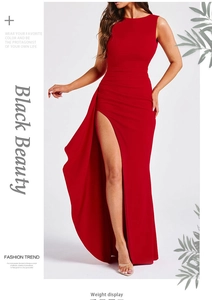 Detail of high side slit and pleated waist design on a red sleeveless maxi dress