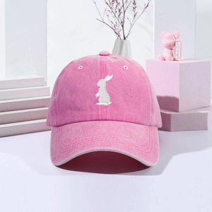 Stylish pink washed cotton baseball cap featuring white rabbit animal embroidery for outdoors