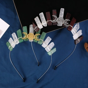 Handmade natural crystal raw stone crown headband with metal moon charms on dark velvet
