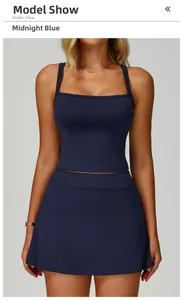 Front view of midnight blue double-strap yoga vest and high-stretch sports skirt set