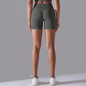 Detail view of high-waist seamless gym shorts with V-shaped back scrunch and ribbing