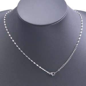 Detail of silver stainless steel lip chain necklace with lobster clasp and extender