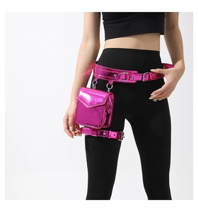 Detailed view of pink metallic mini leg bag with adjustable waist strap on model