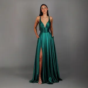 Elegant dark green satin maxi dress featuring deep V-neck, high slit and waist cinch design